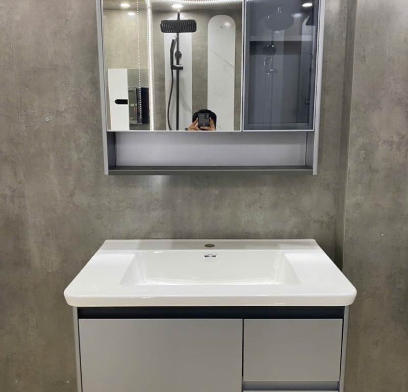 Mẫu tủ Lavabo ghi sáng tối giản, tinh tế cho phòng tắm hiện đại.